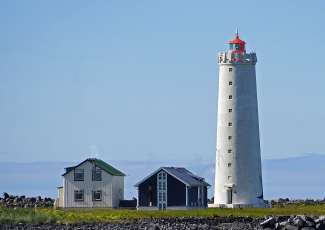 Grótta Island Lighthouse in Seltjarnarnes is een gewild uitkijkpunt voor het Noorderlicht.